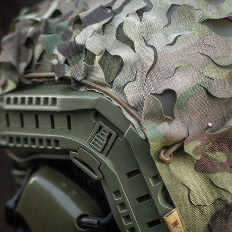 M-Tac Vilha Laser Cut FAST Helmet Cover Multicam, <span>designed specifically for all types of FAST helmets. This model is designed for camouflage on rugged terrain and protects from external contaminents .</span>